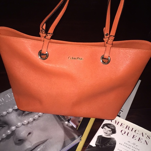 Calvin Klein Handbags - SOLD SOLD .Calvin Klein tote in a beautiful orange